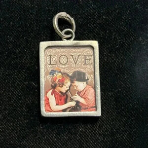 Pick up Sticks Jewelry Love Charm.  No longer available for purchase!!